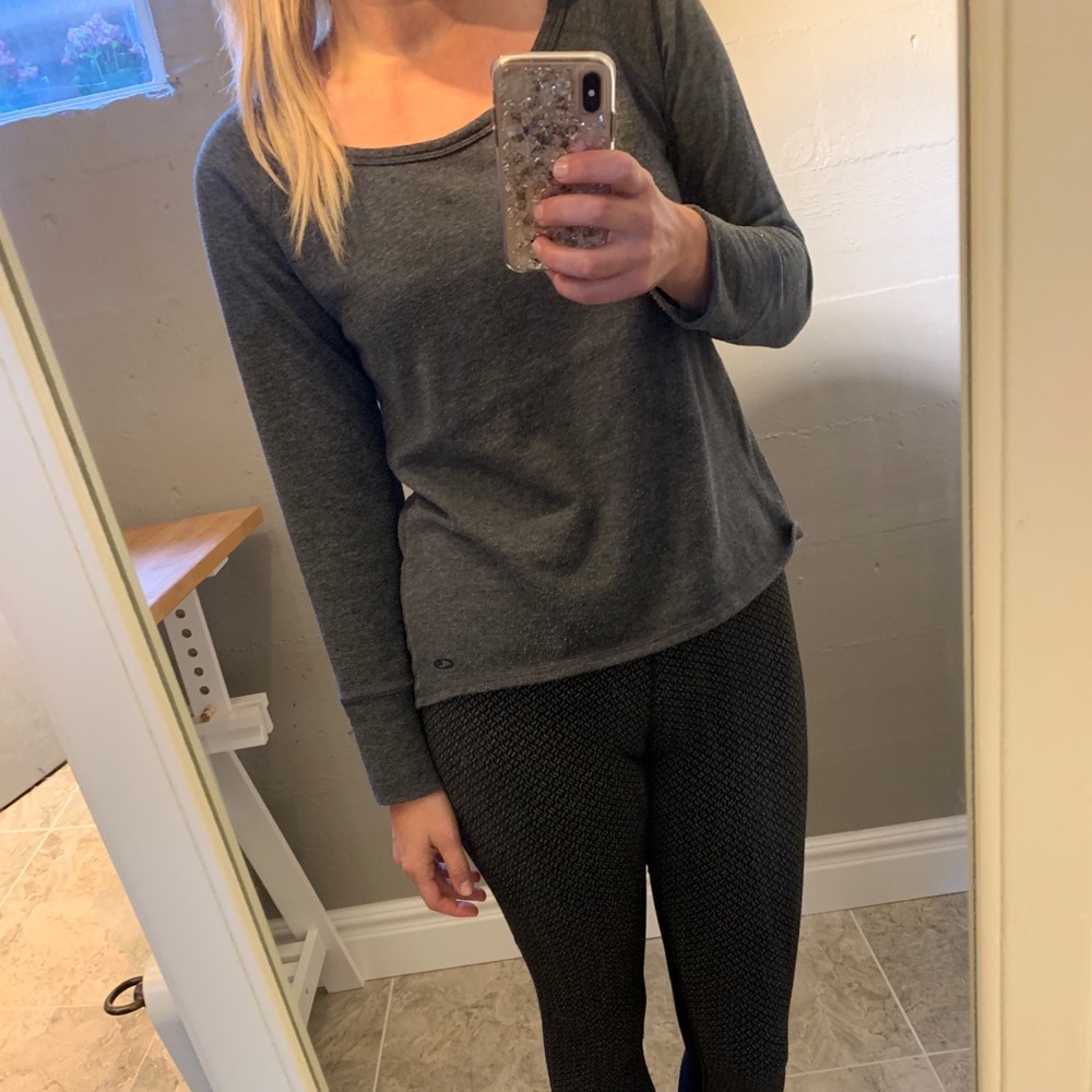 Grey scoop neck sweatshirt with drop back hem